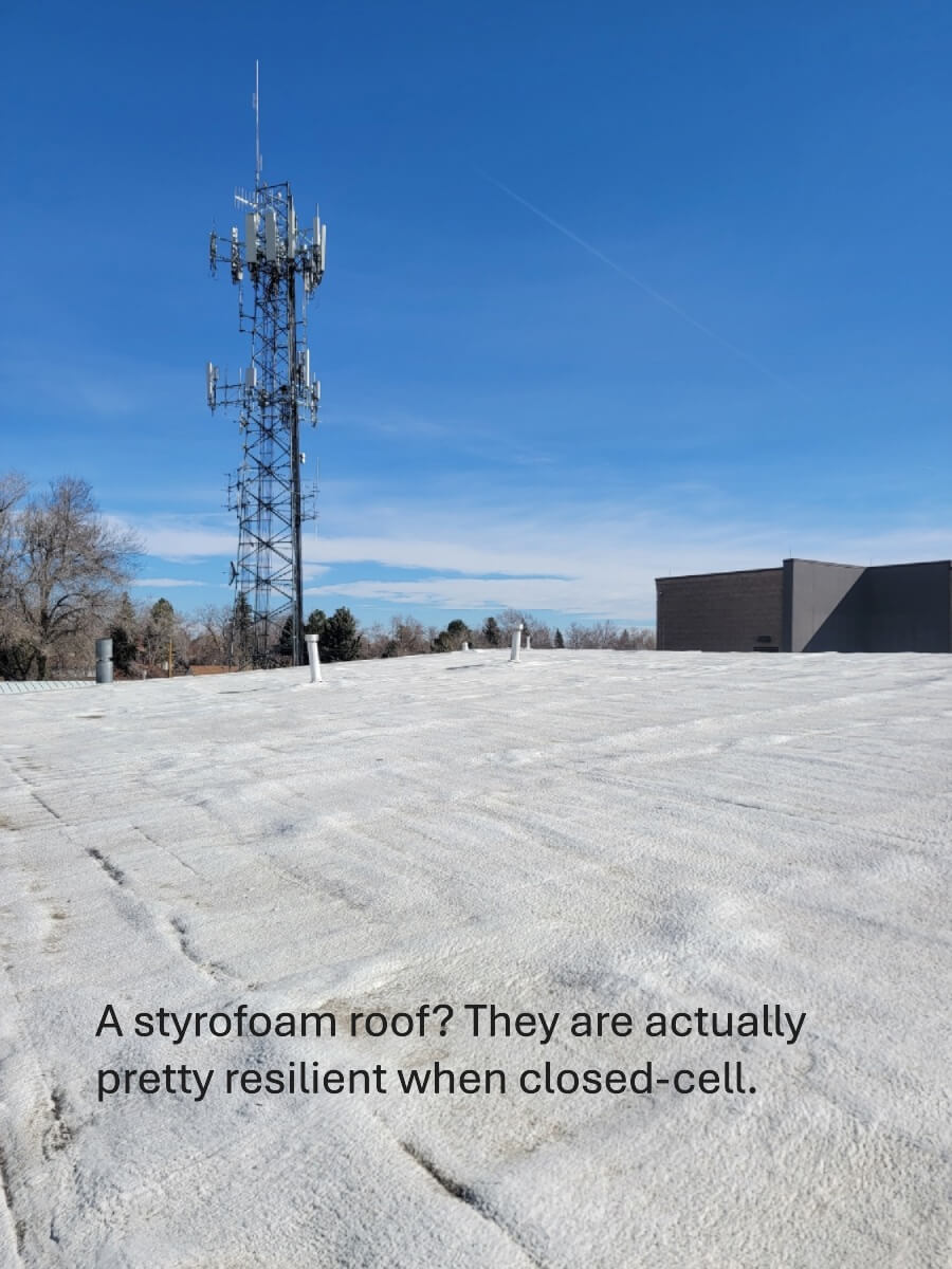 A white spray foam commercial roof.